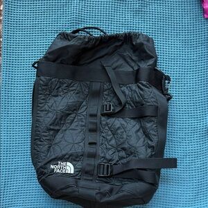 The North Face Black Quilted Duffel Bag with Logo